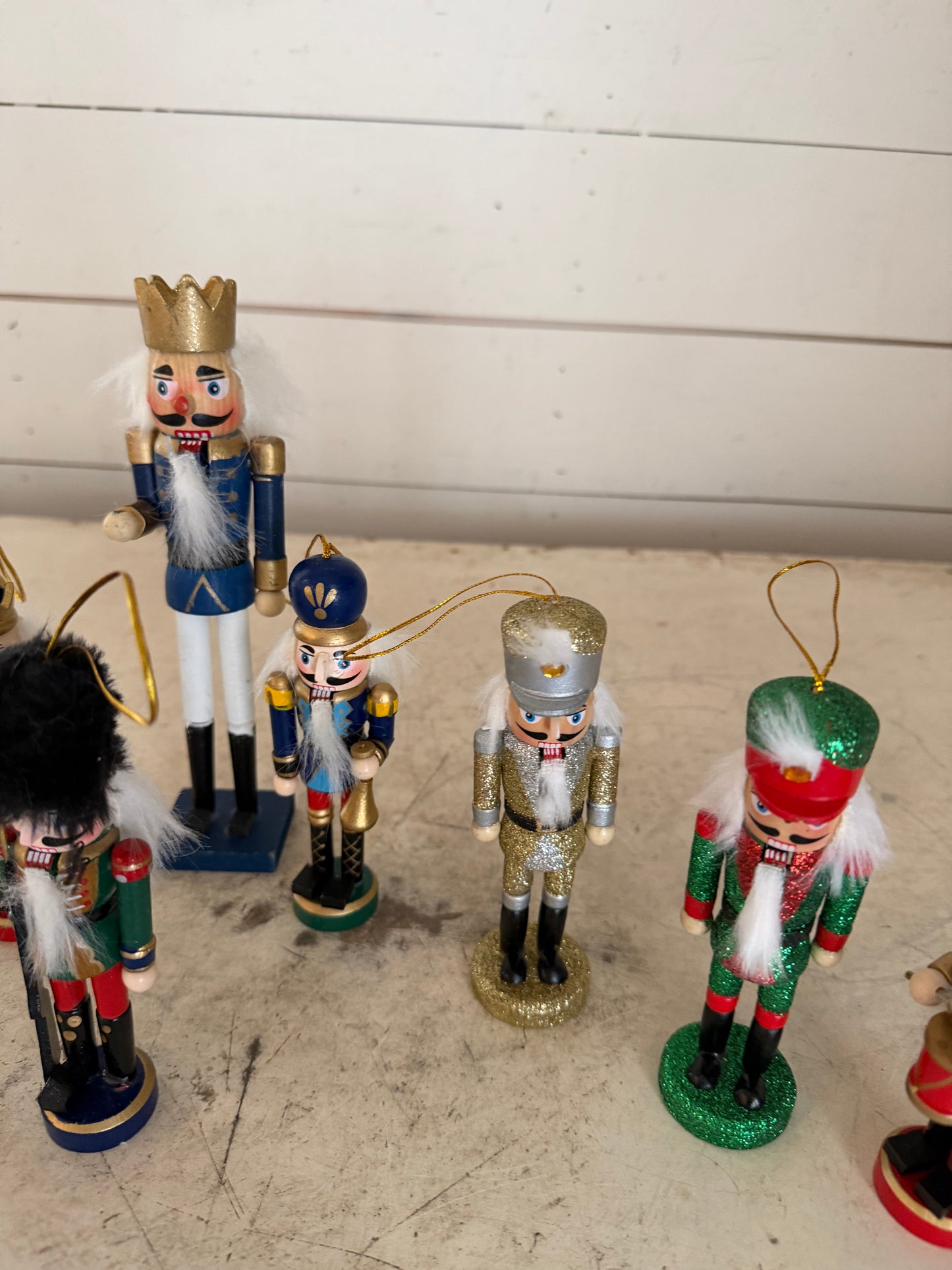 Set of nutcrackers as found one missing hand