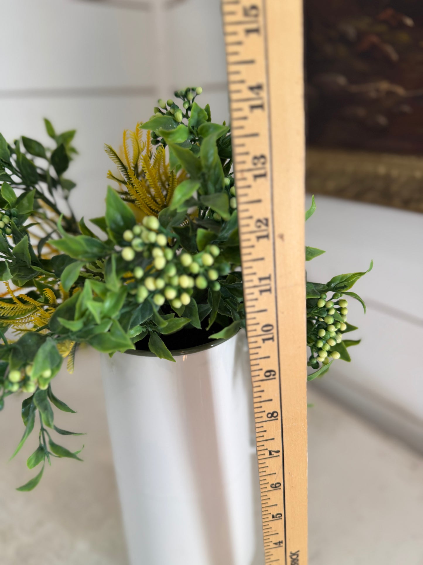 Enamel pitcher with greenery
