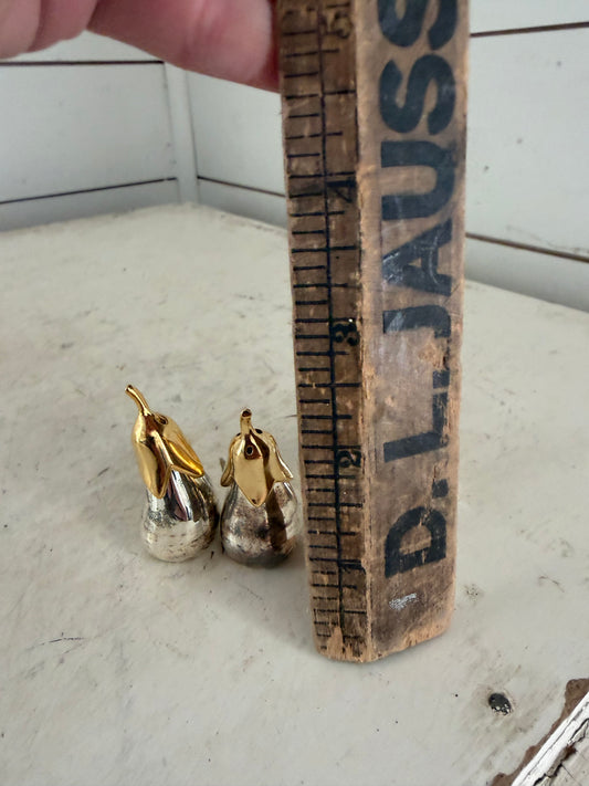 Set of silver eggplant, salt, and pepper shakers each that sold separately