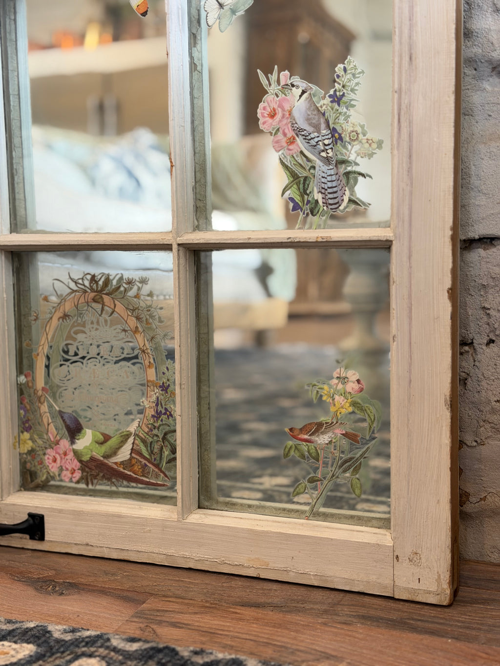 Window with old glass and mirror behind