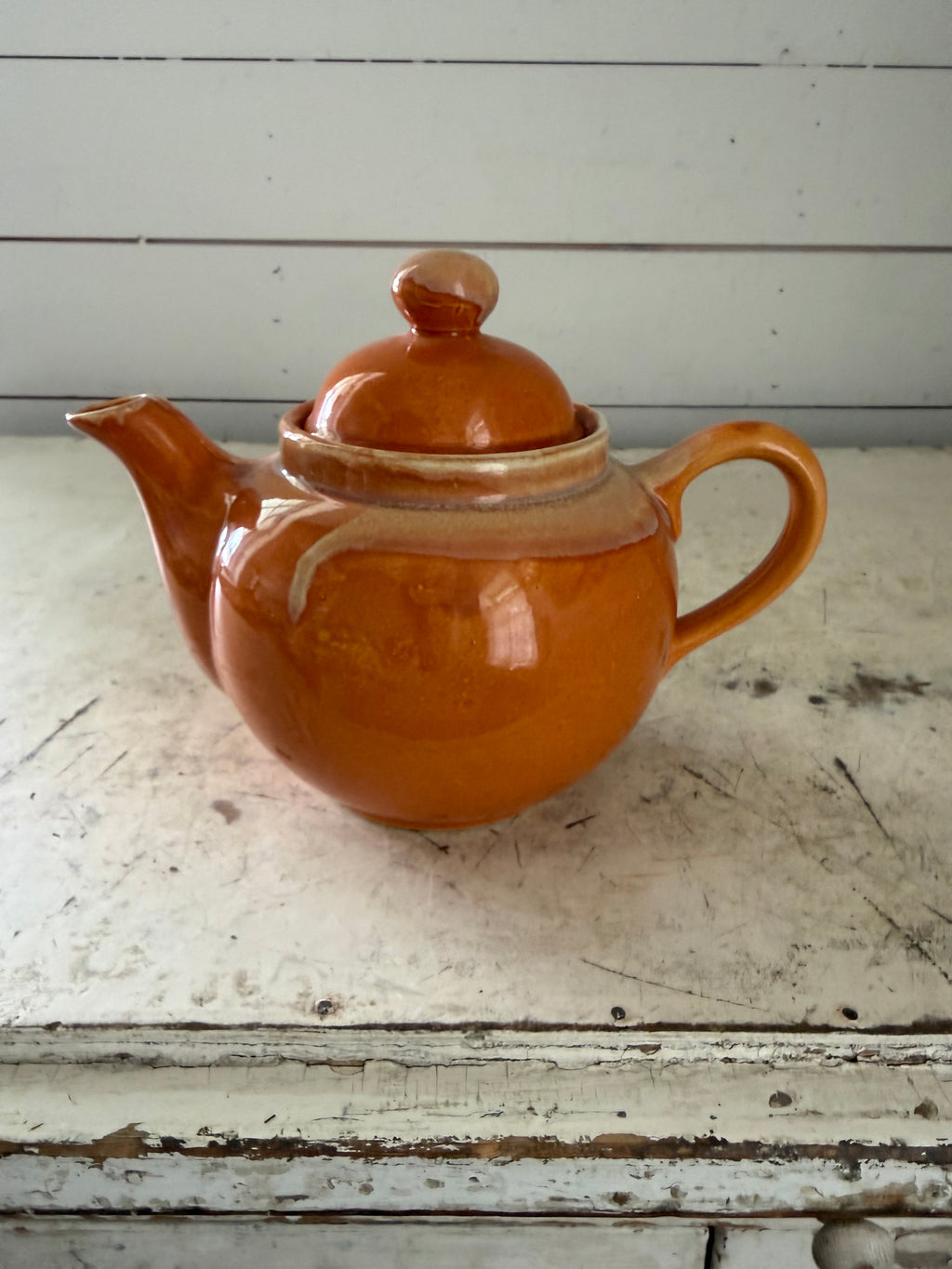 Ceramic orange glazed tea pot has some chip under lid - Madd in Japan