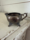 Vintage silver plate creamer with feet