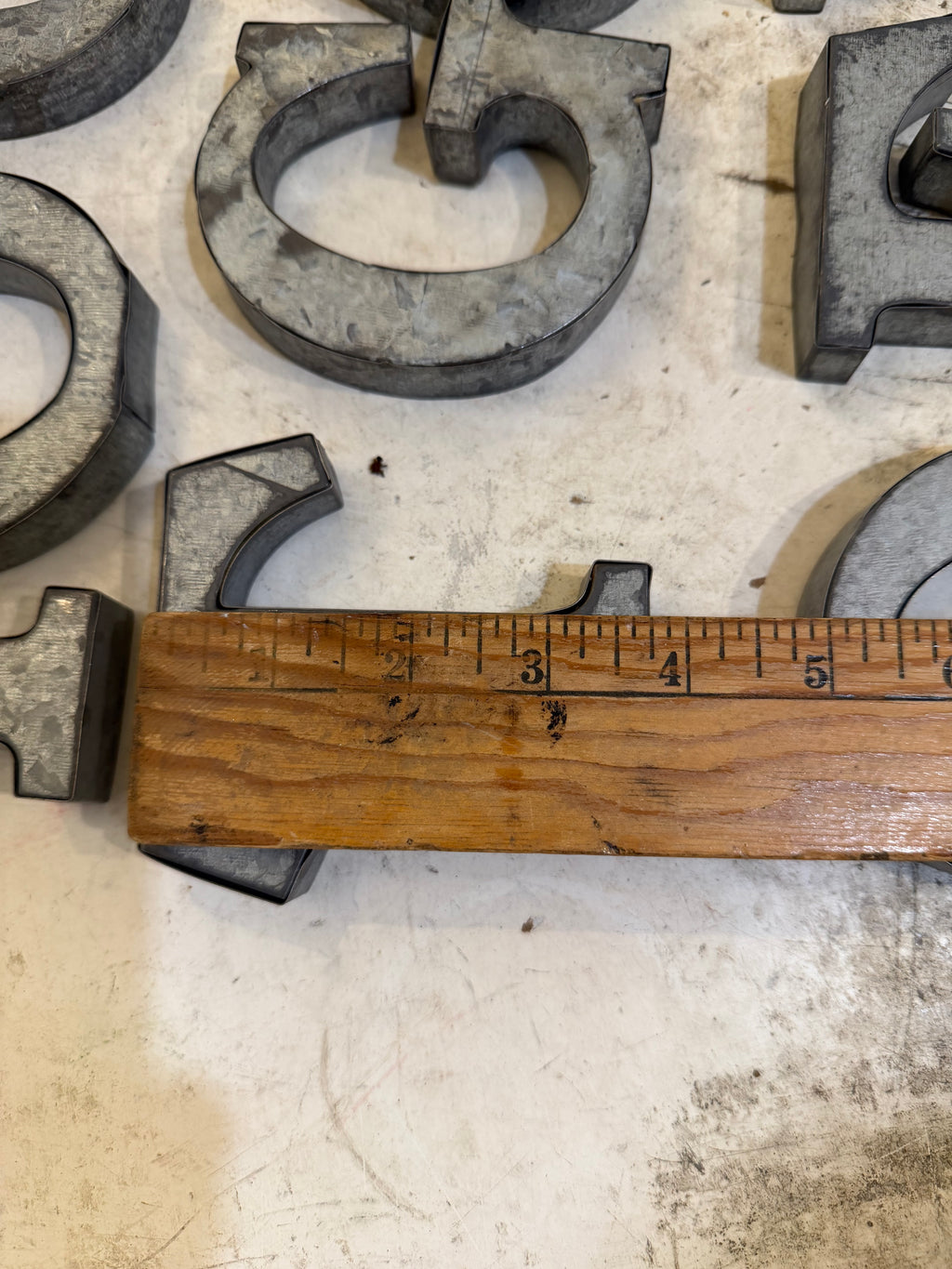 Rustic galvanized, tin letters sold individually Rusted galvanized, tin letters sold individually 3-3/4” - hanging hardware on back