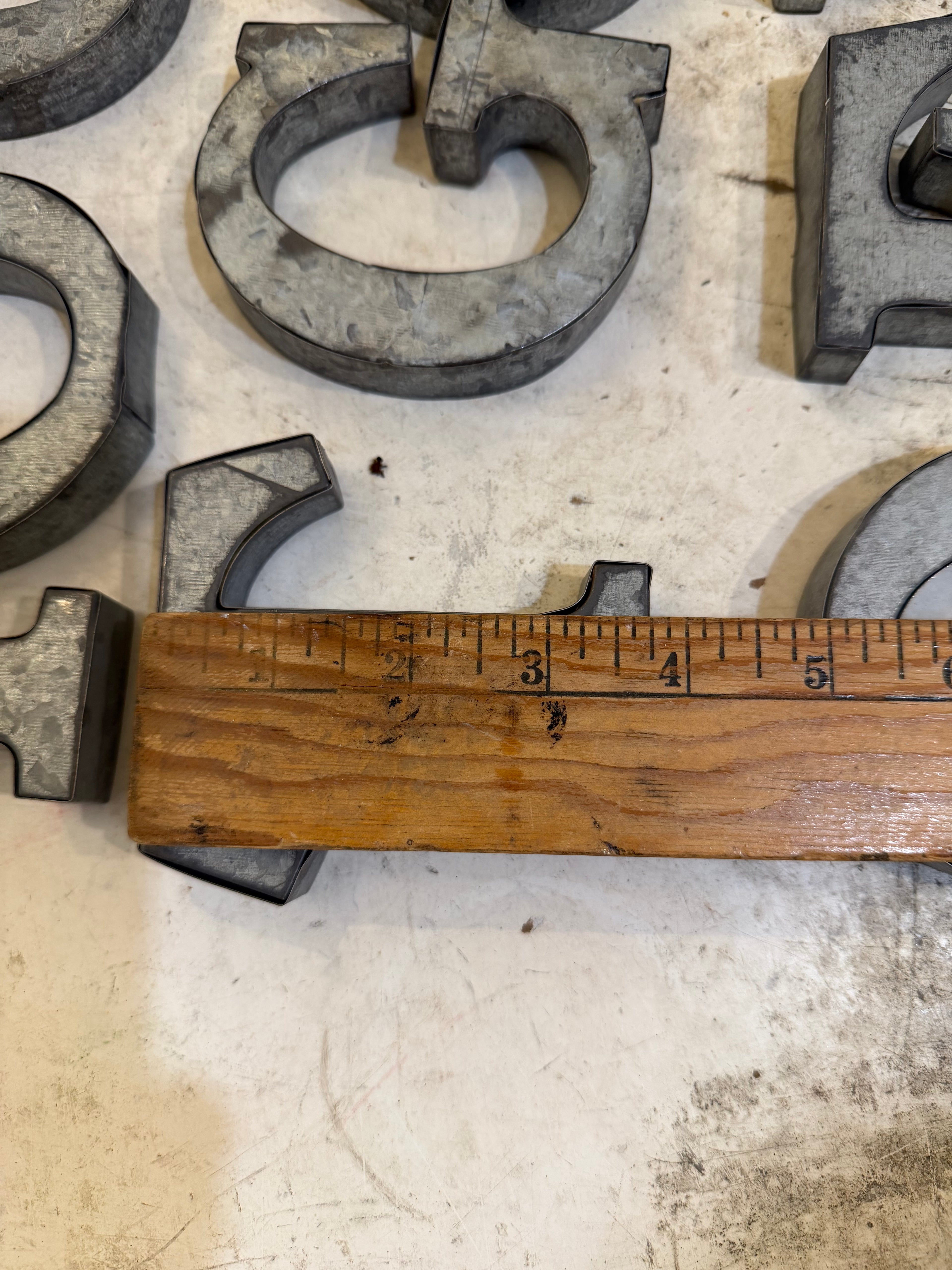 Rustic galvanized, tin letters sold individually Rusted galvanized, tin letters sold individually 3-3/4” - hanging hardware on back