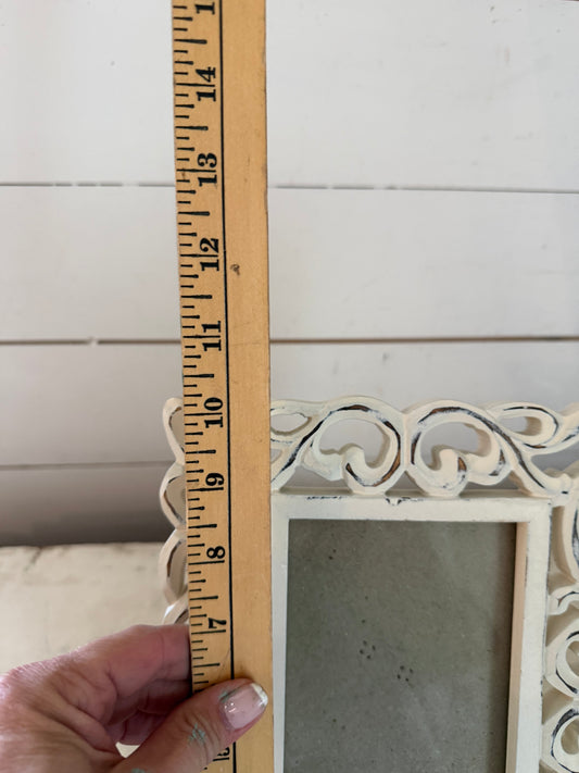White Scroll Frame will get at