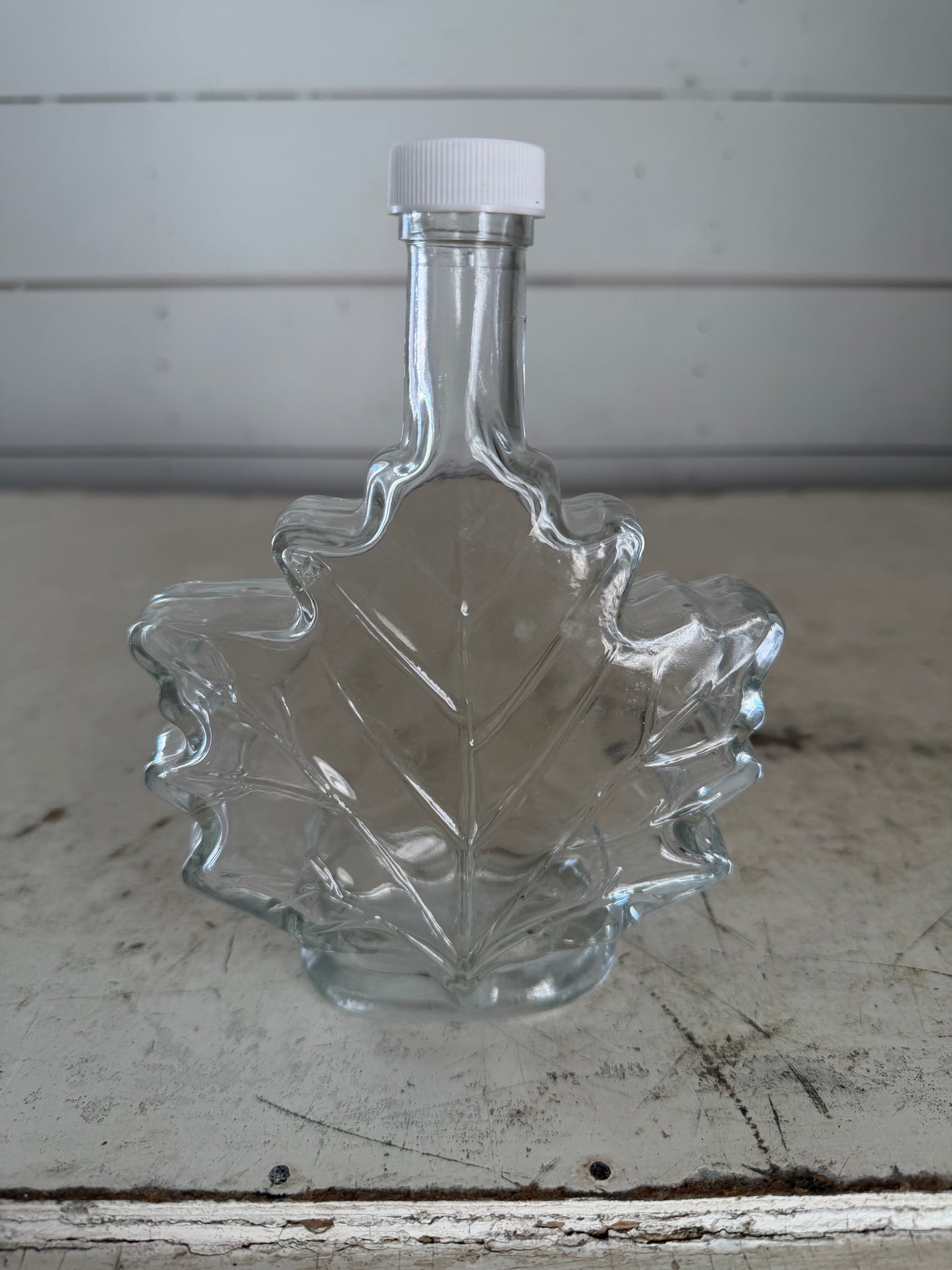 Clear Glass Maple Leaf Syrup bottle