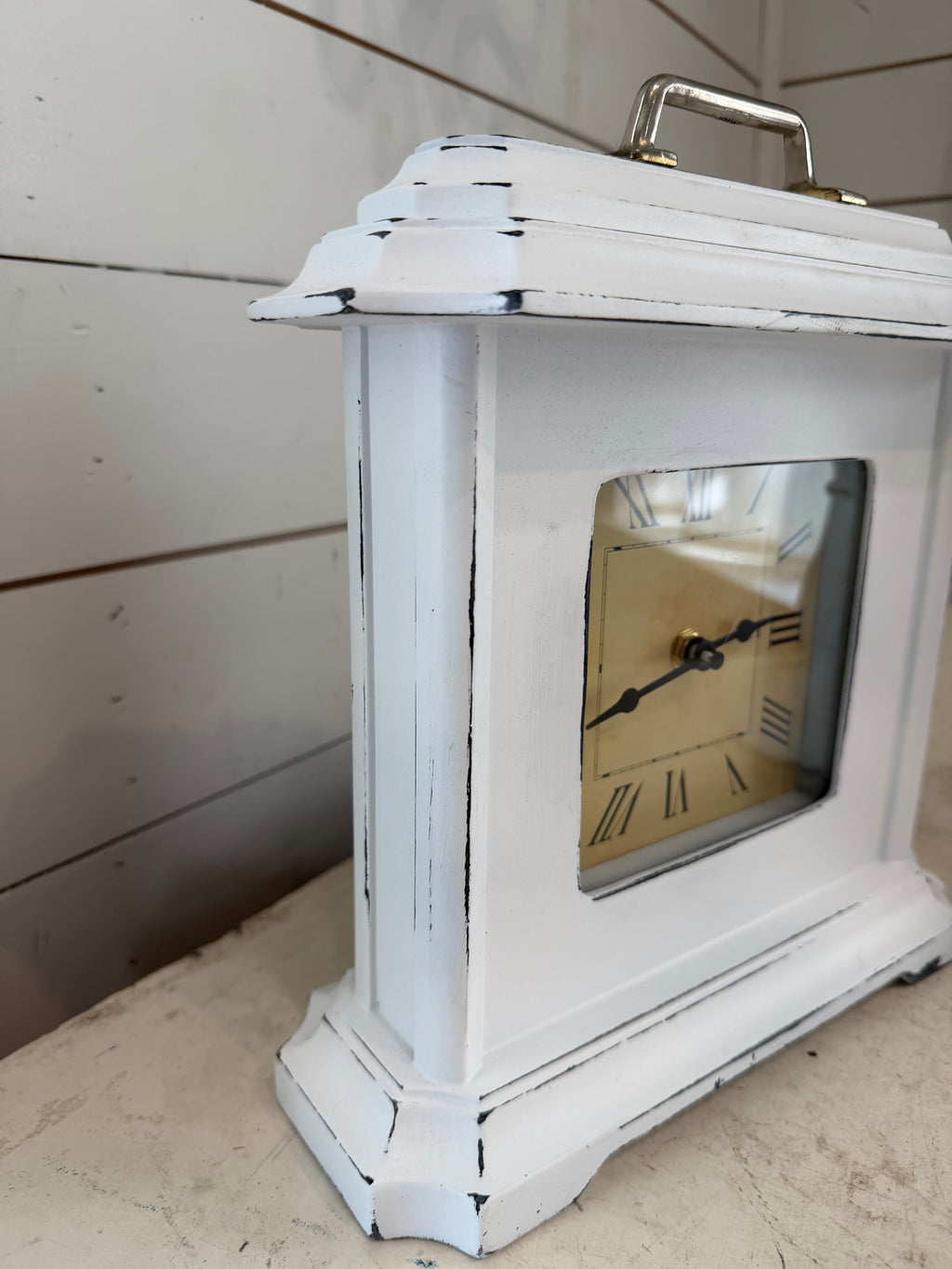 Hand-painted white clock with pull on top
