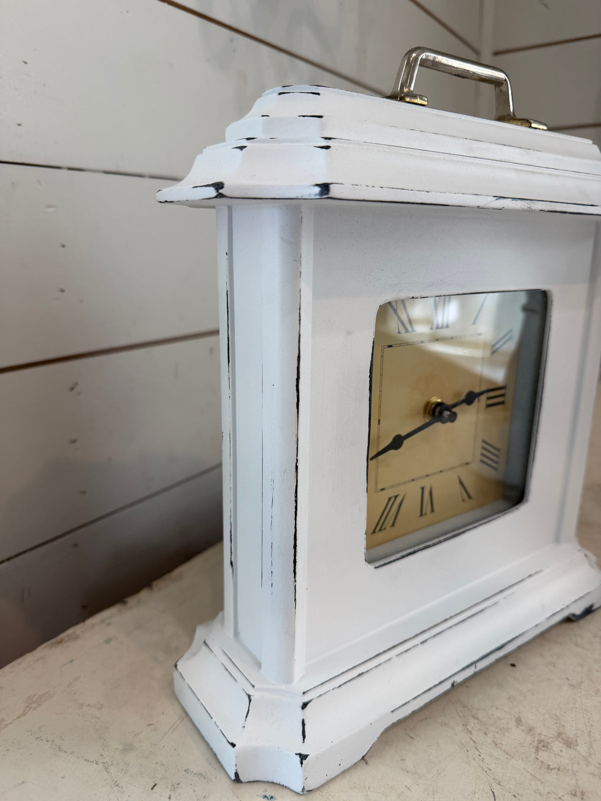 Hand-painted white clock with pull on top