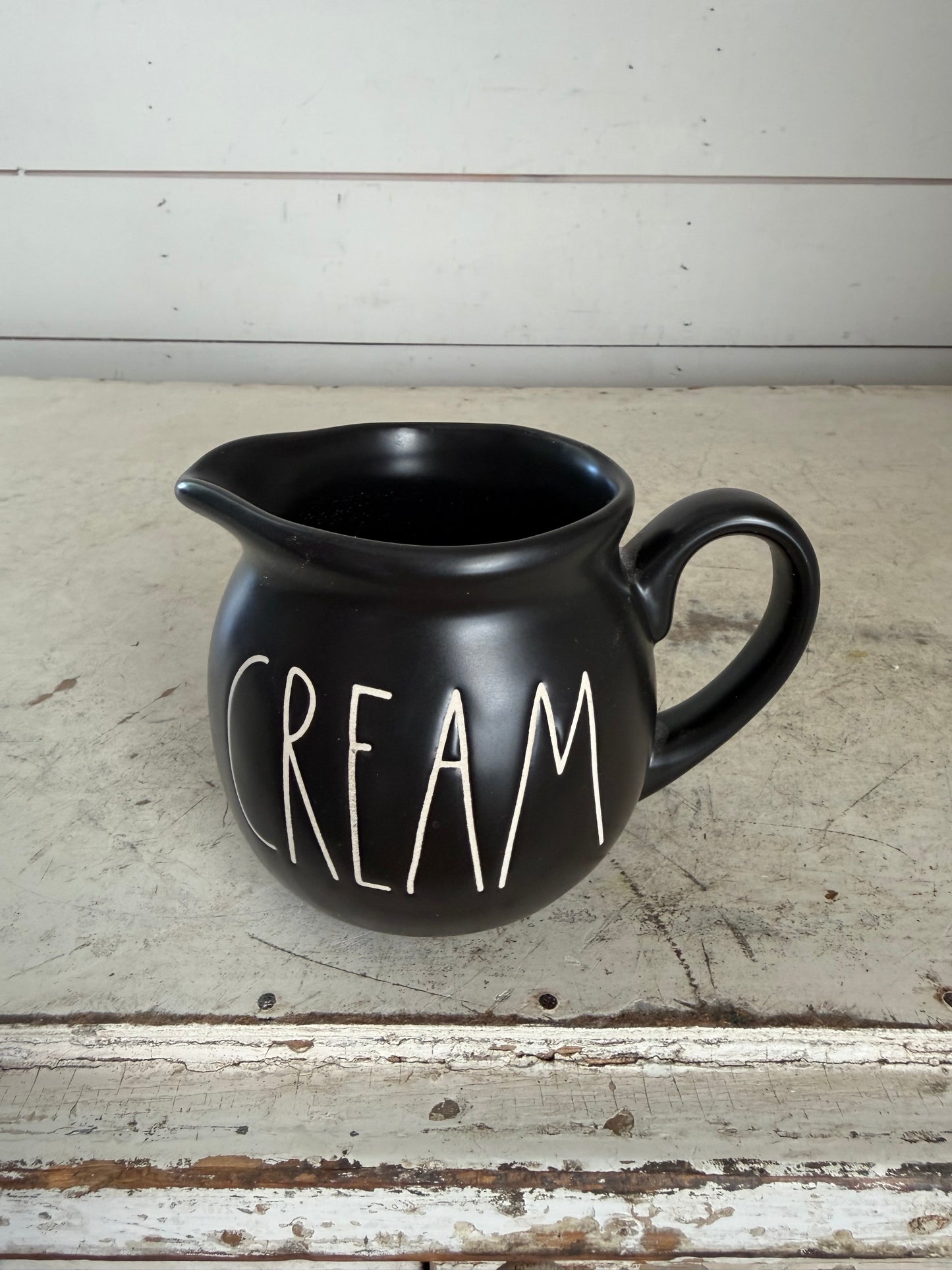 Rae Dunn “Cream” Creamer in Black