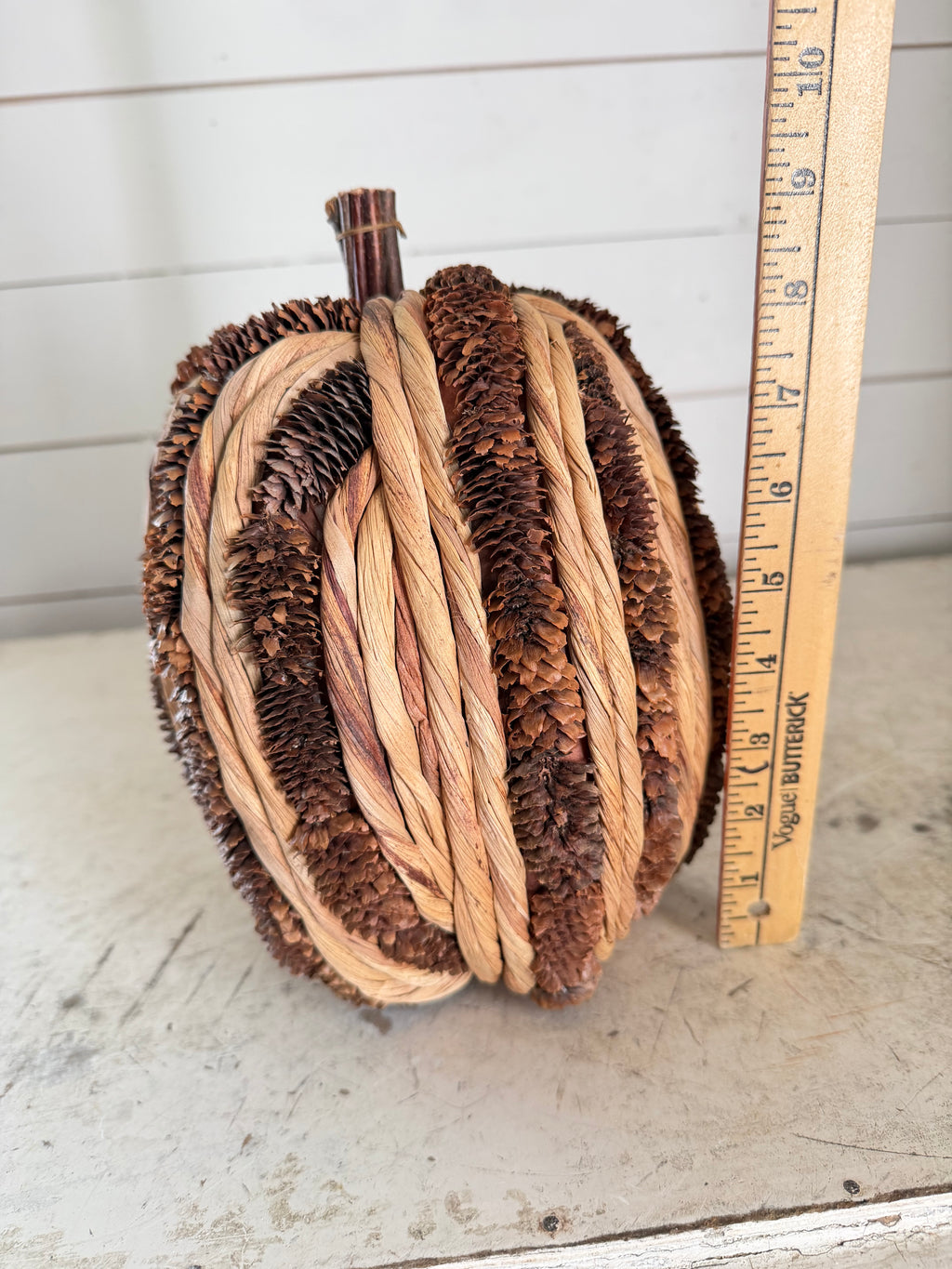 Braid and pinecone pumpkin