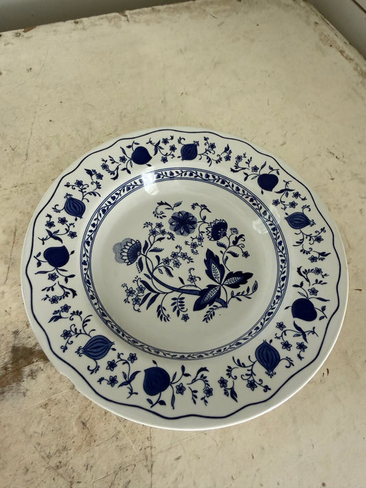 Chipped blue onion bowl