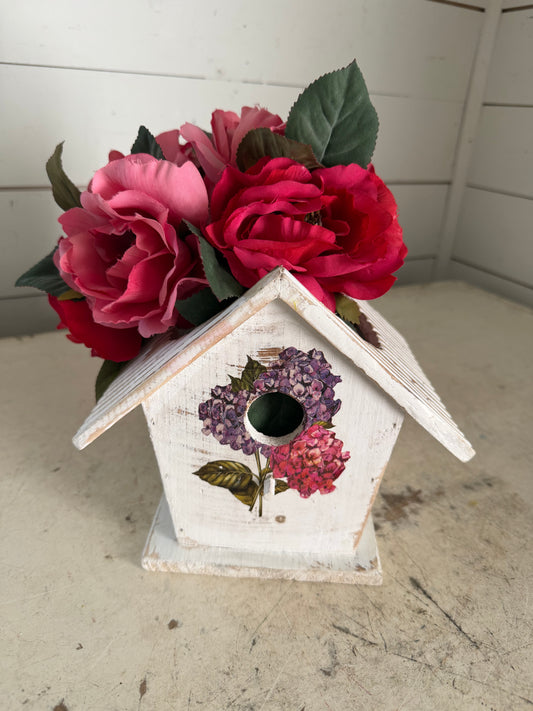 Birdhouse planter with roses