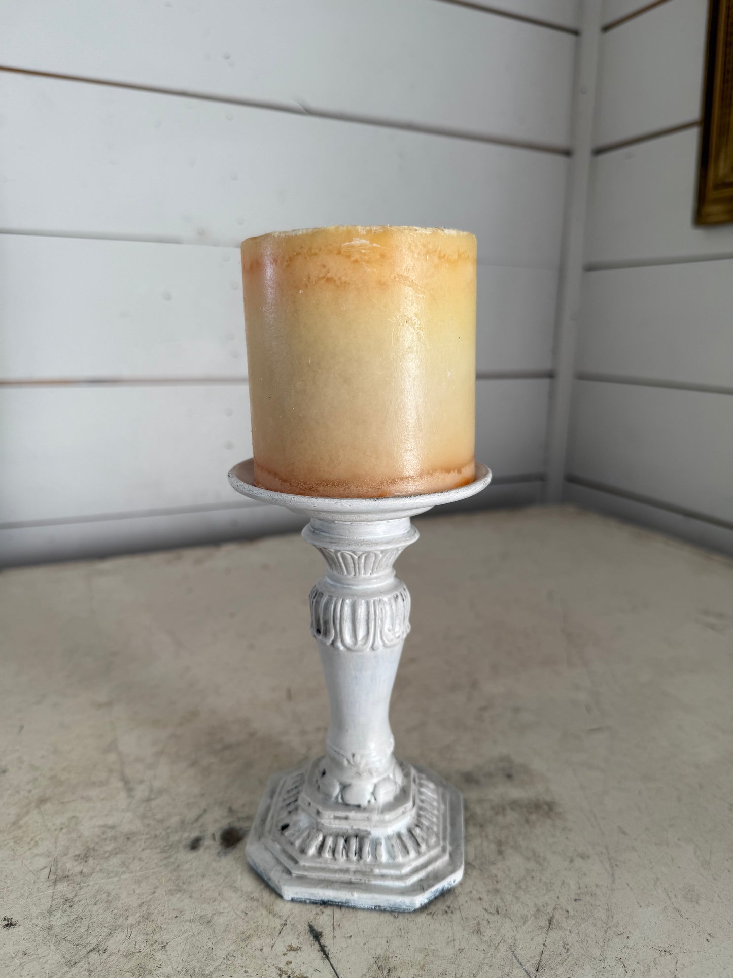 White candlestick with candle