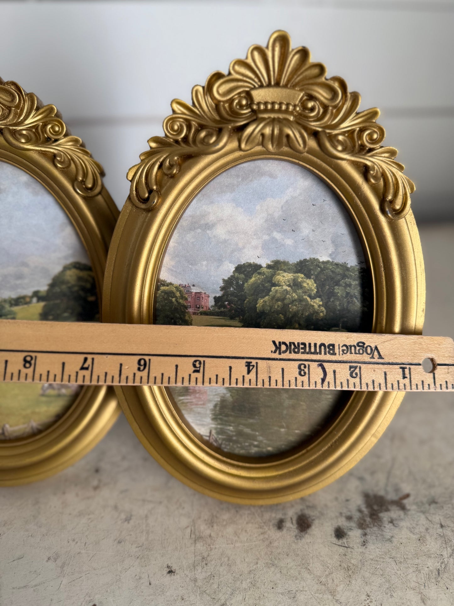 Gold colored resin frames sold as set