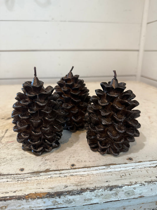 Pottery Barn brown metallic pinecone candle - some of the pinecone petals may be loose in bag - sold individually
