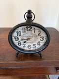 Oval metal clock will get makeover
