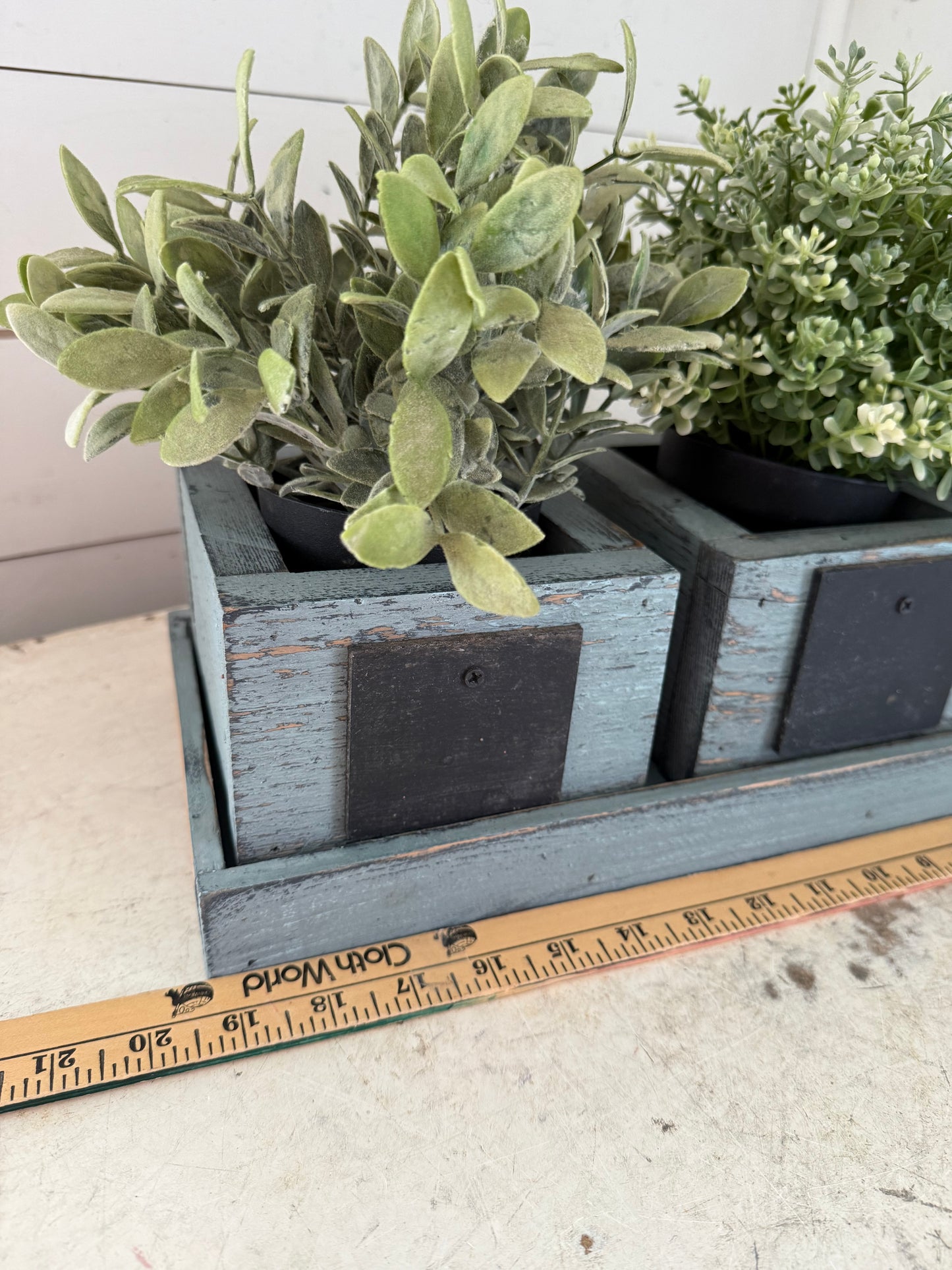 Set of three planters with tray floral not included