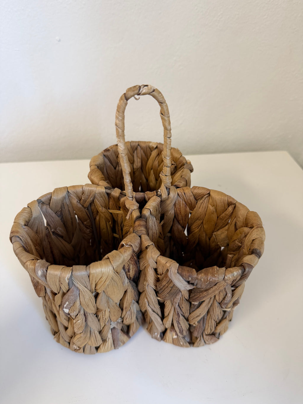 Natural water hyacinth woven utensil and cutlery caddy with a center loop handle