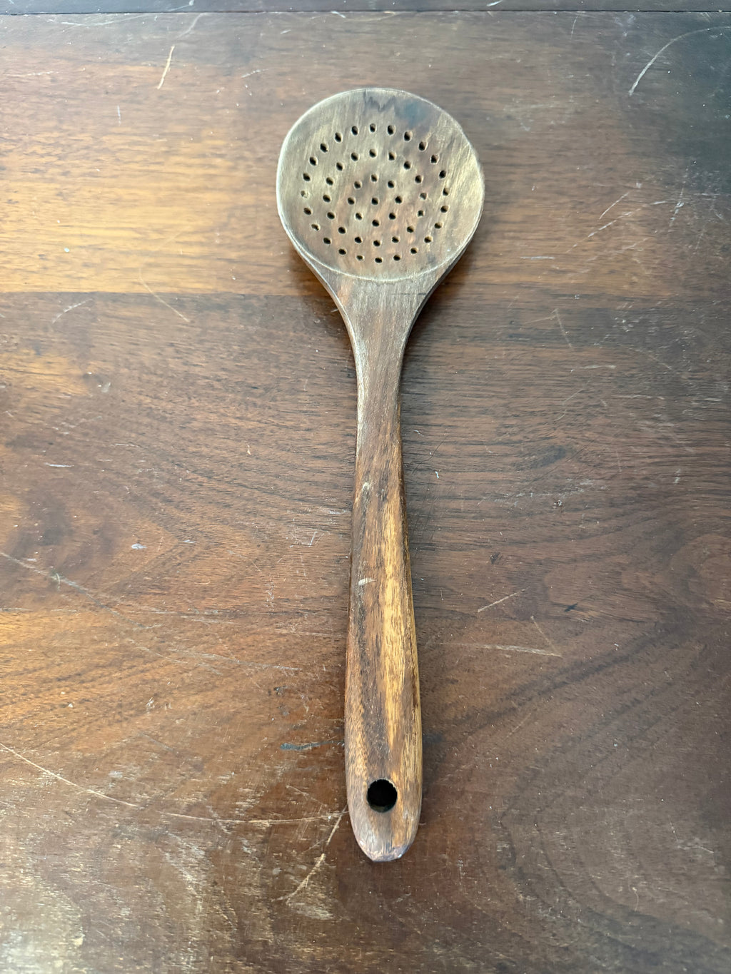 Wooden slotted spoon