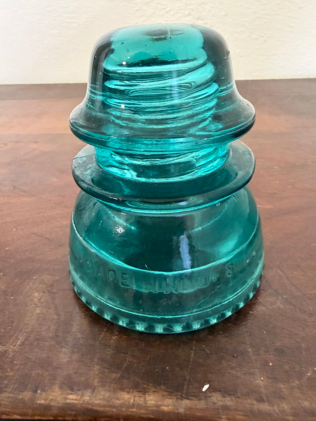 Antique blue green insulator