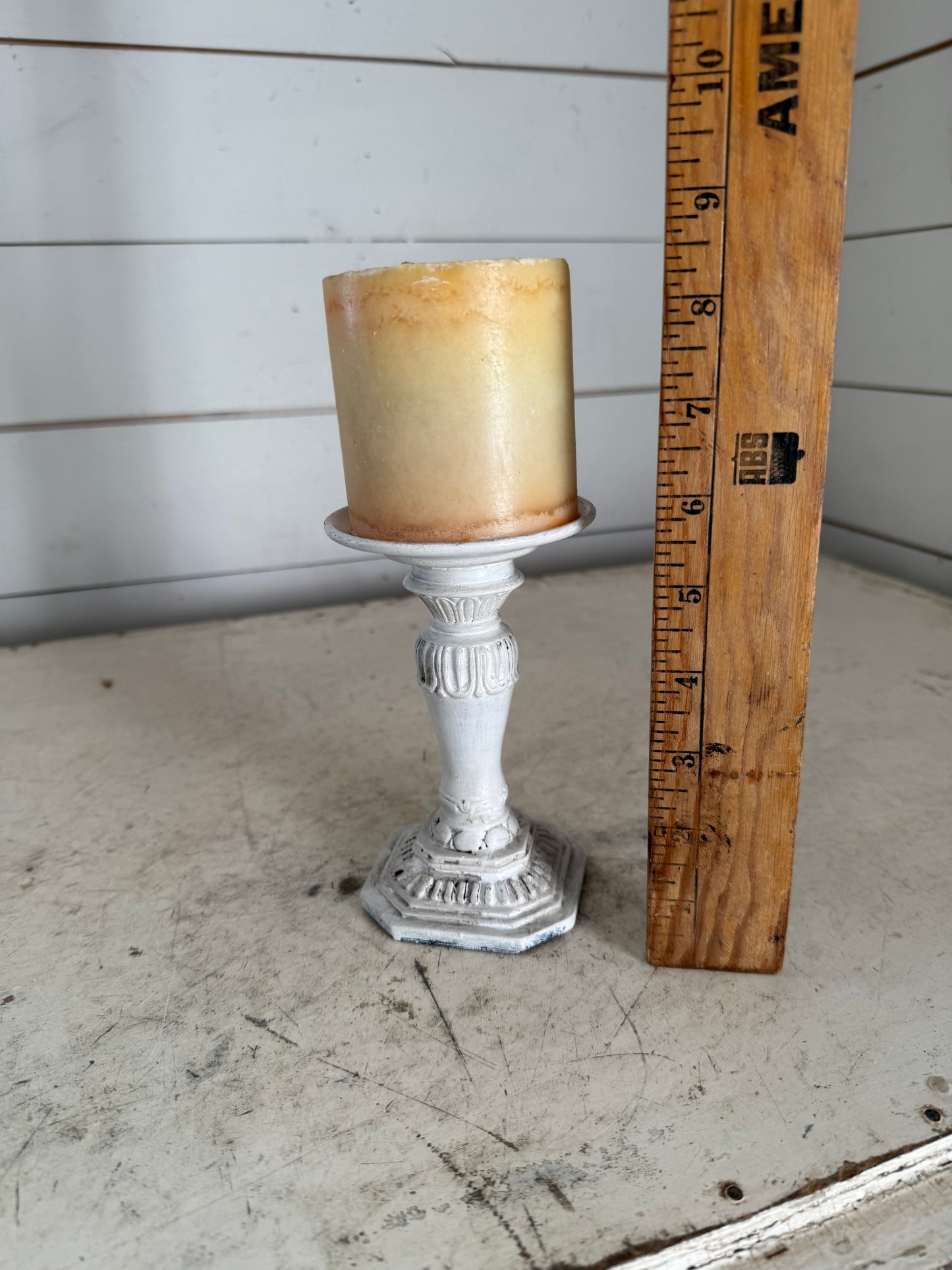 White candlestick with candle