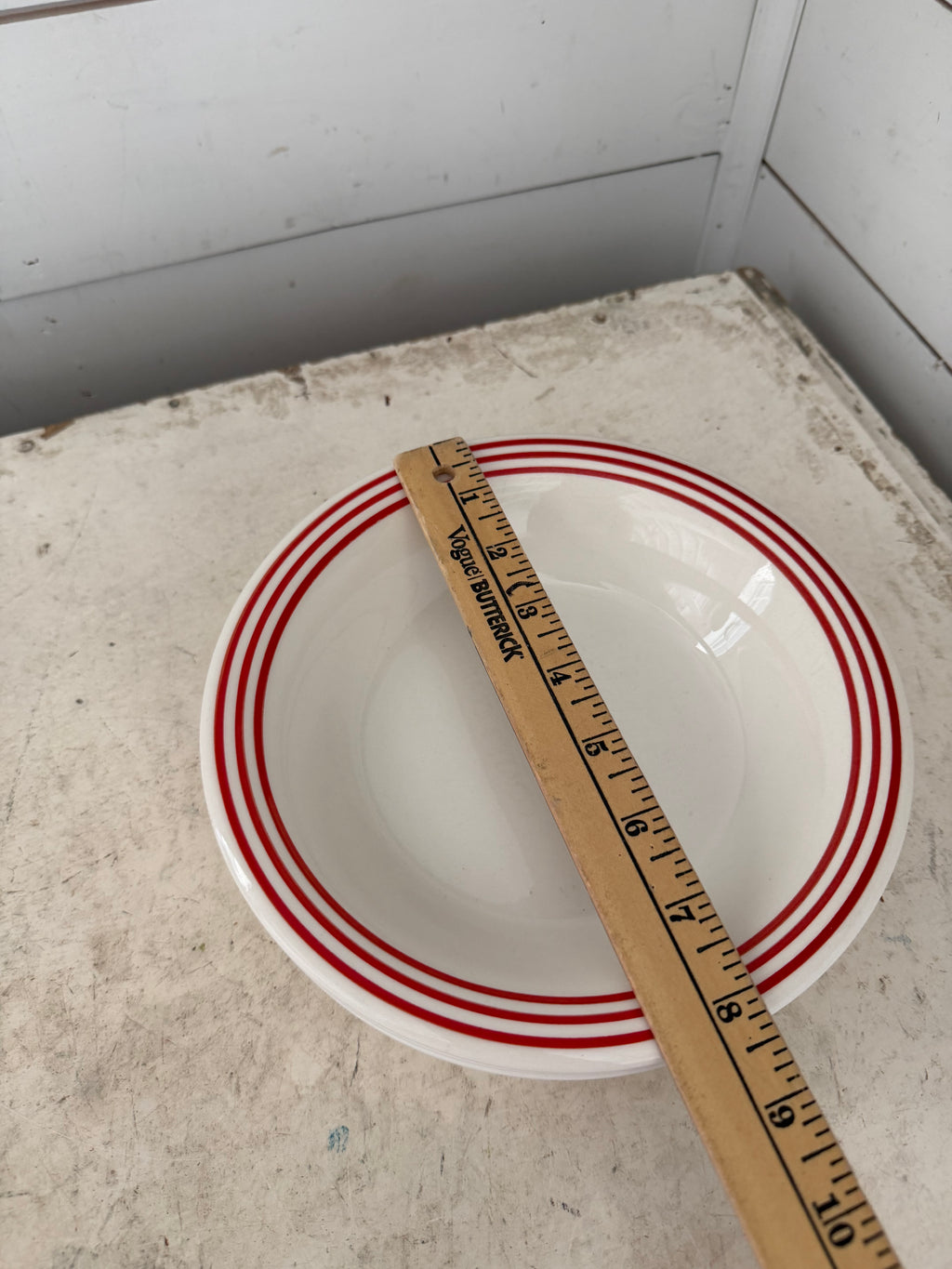 Stoneware bowl with red stripes sold individually