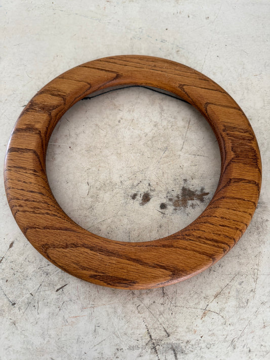 Round wood frame will get makeover and art