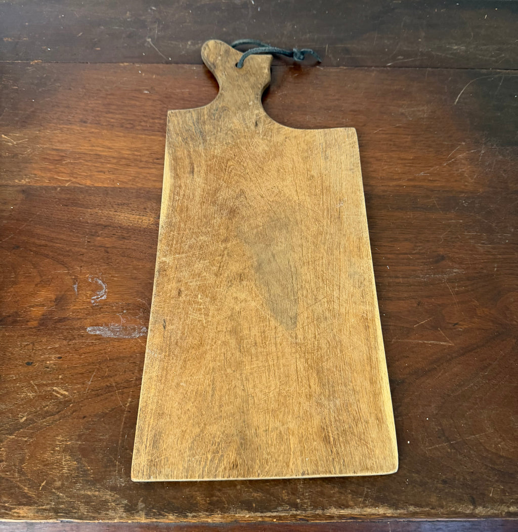 Rectangle hand, cut cutting board with leather strap