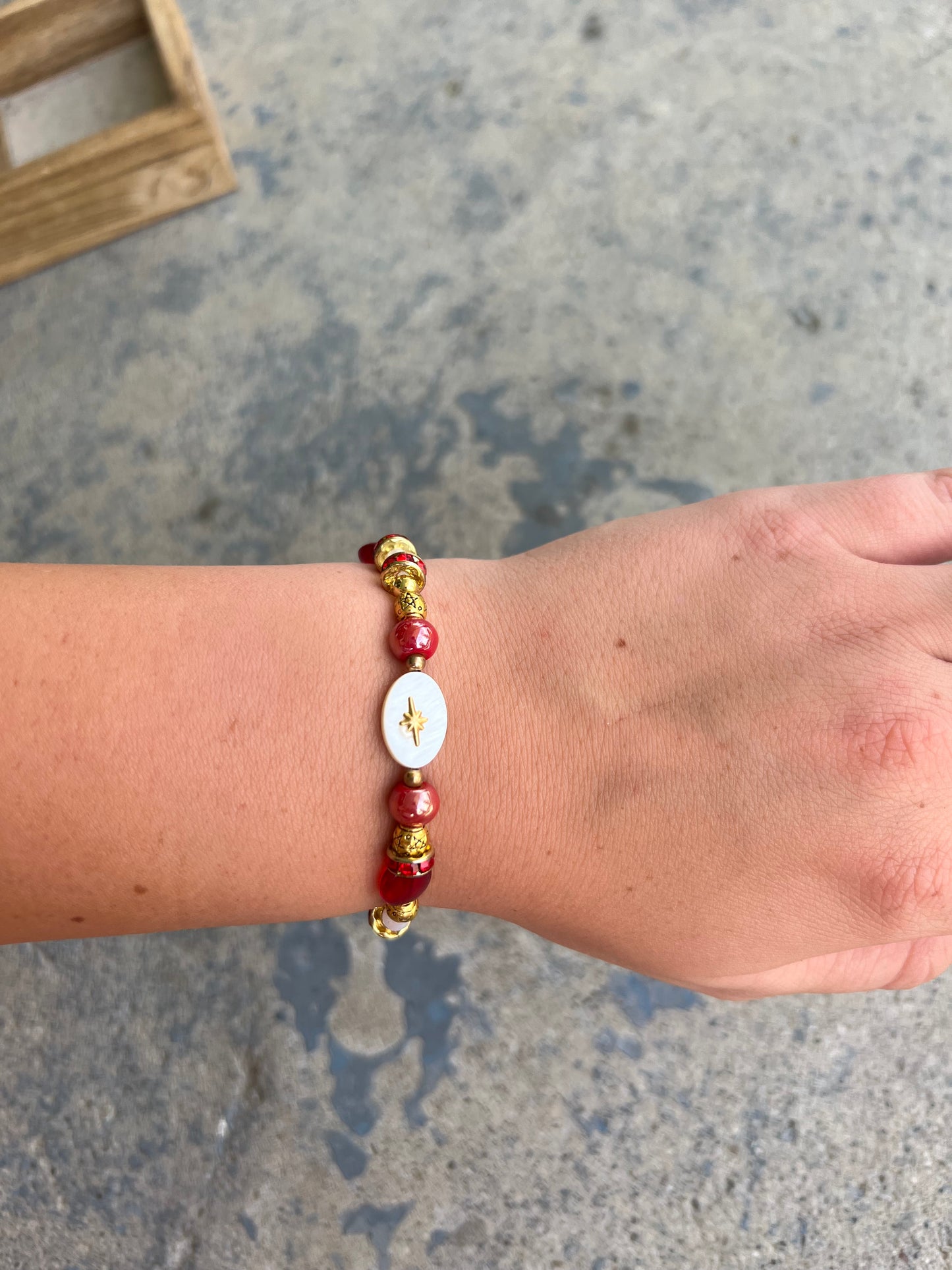 Red and gold star handmade beaded bracelet