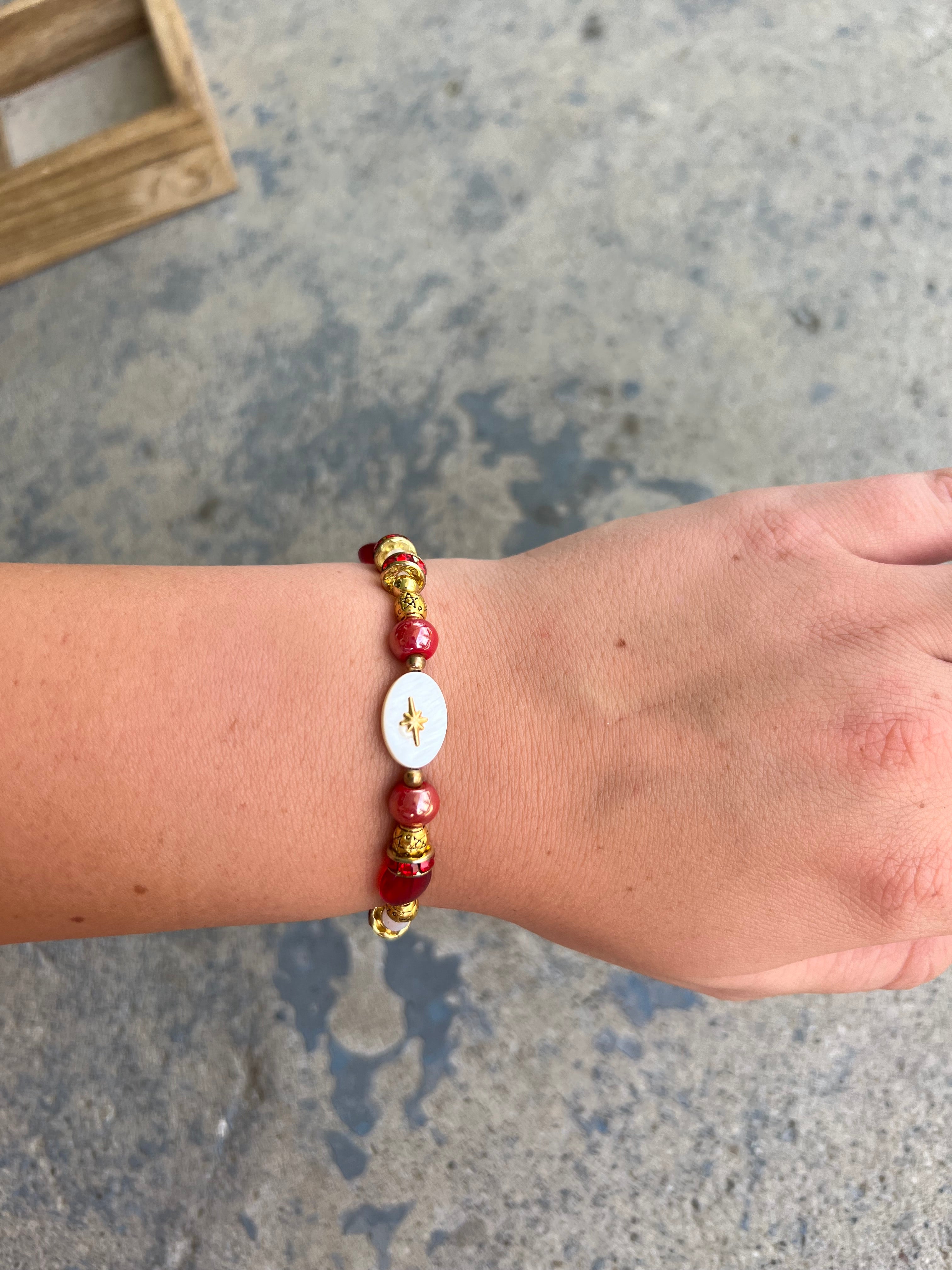 Red and gold star handmade beaded bracelet