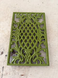 Green cast-iron trivet