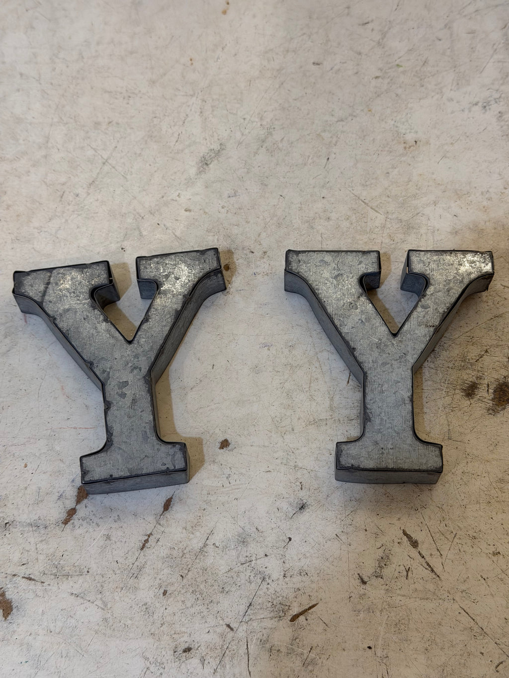 Rustic galvanized, tin letters sold individually Rusted galvanized, tin letters sold individually 3-3/4” - hanging hardware on back