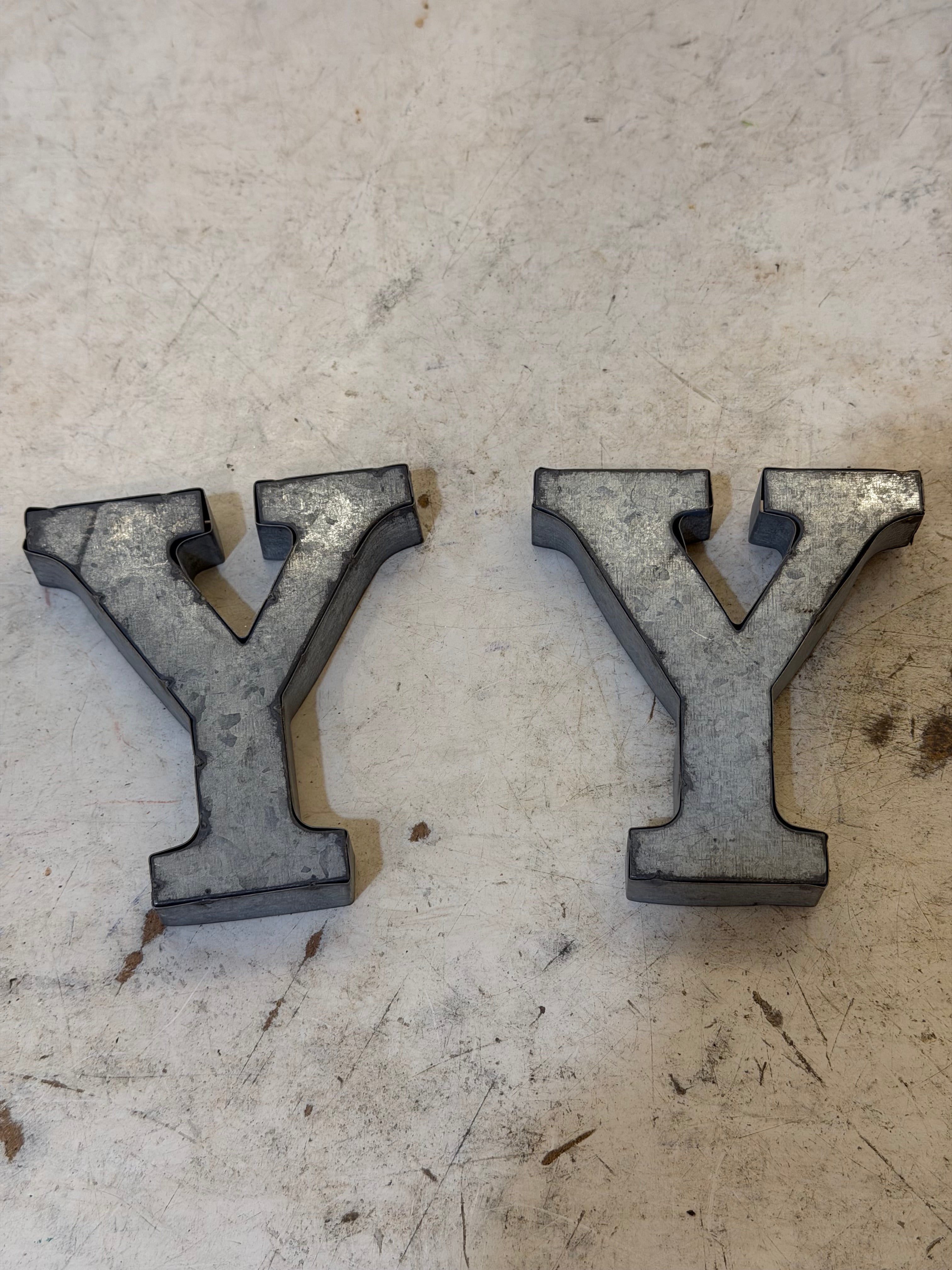Rustic galvanized, tin letters sold individually Rusted galvanized, tin letters sold individually 3-3/4” - hanging hardware on back