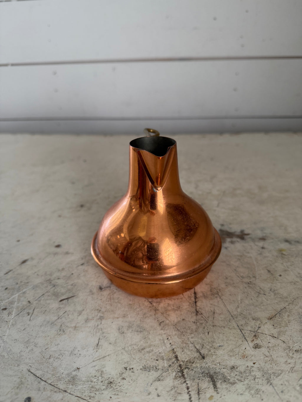 Vintage small copper pitcher with twisted brass handle