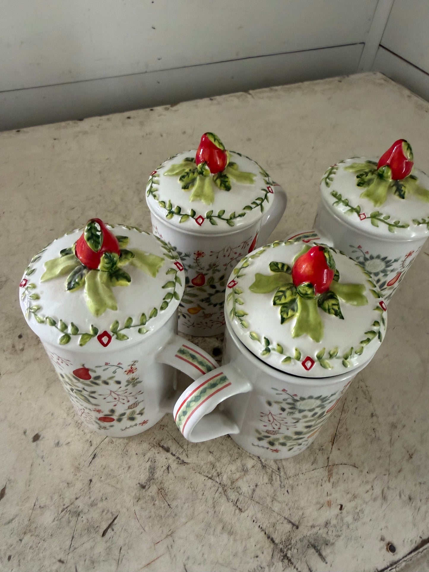Lady Jayne Ltd. porcelain tea mugs with lids featuring a festive fruit and foliage pattern - sold individually ￼