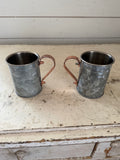 Weighted cup with copper handle