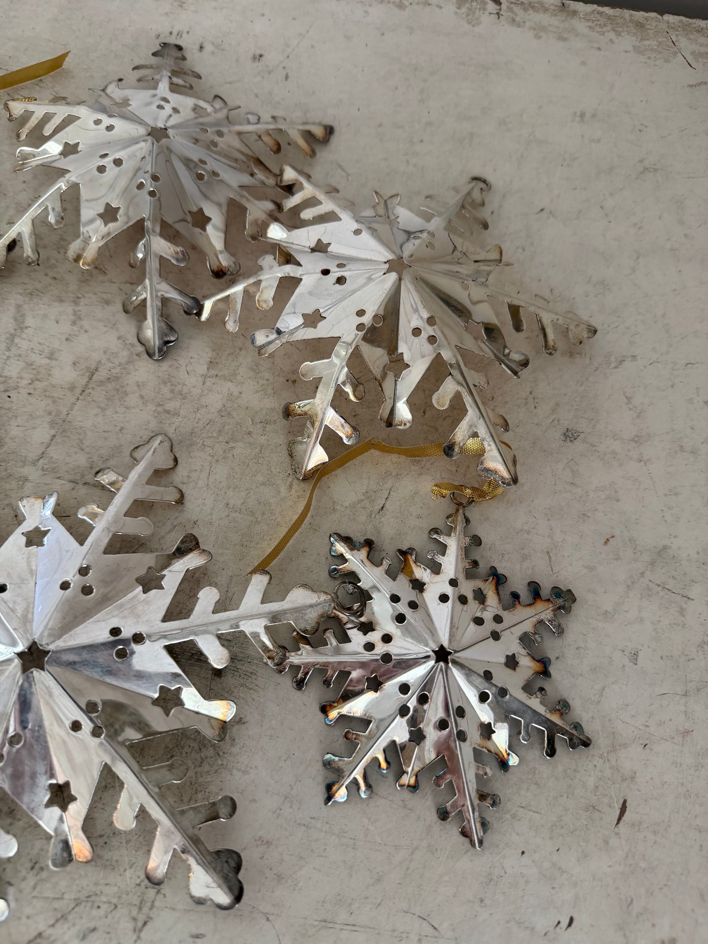 Set of metal snowflake Christmas tree ornaments