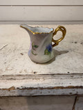 Hand Painted Floral Porcelain Creamer With Gold Handle