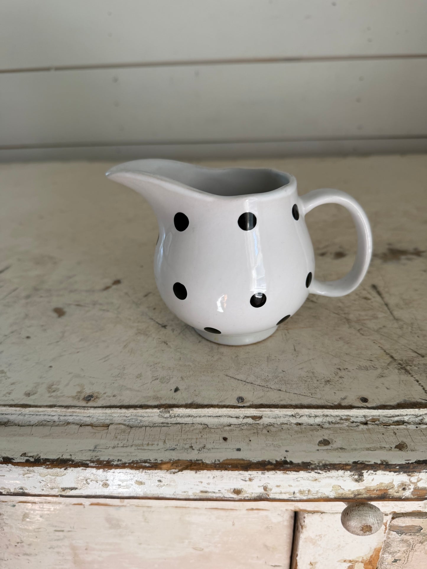 White creamer with Black Polka Dots