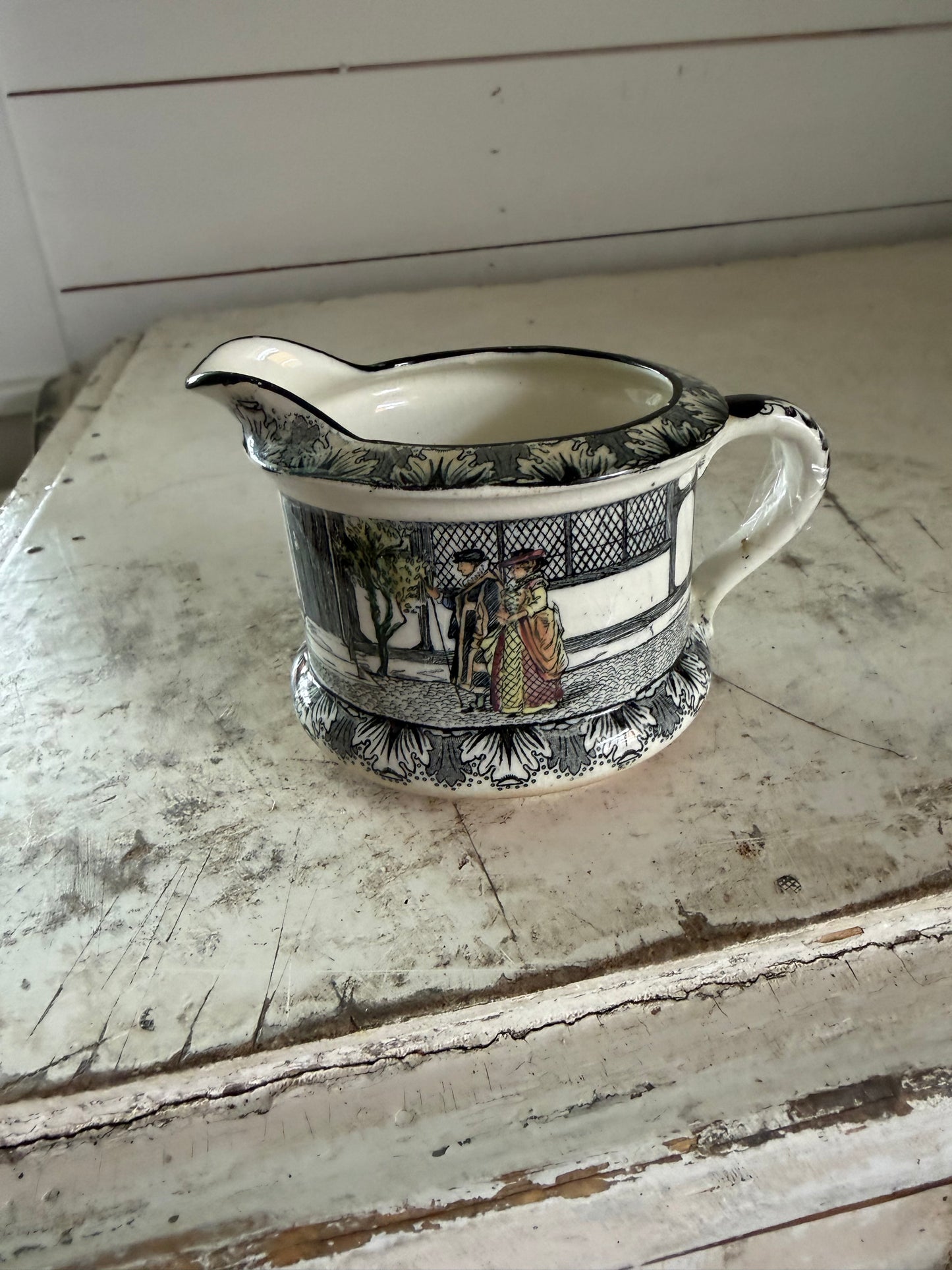 Antique Royal Doulton creamer from the "Old Moreton Hall" series.