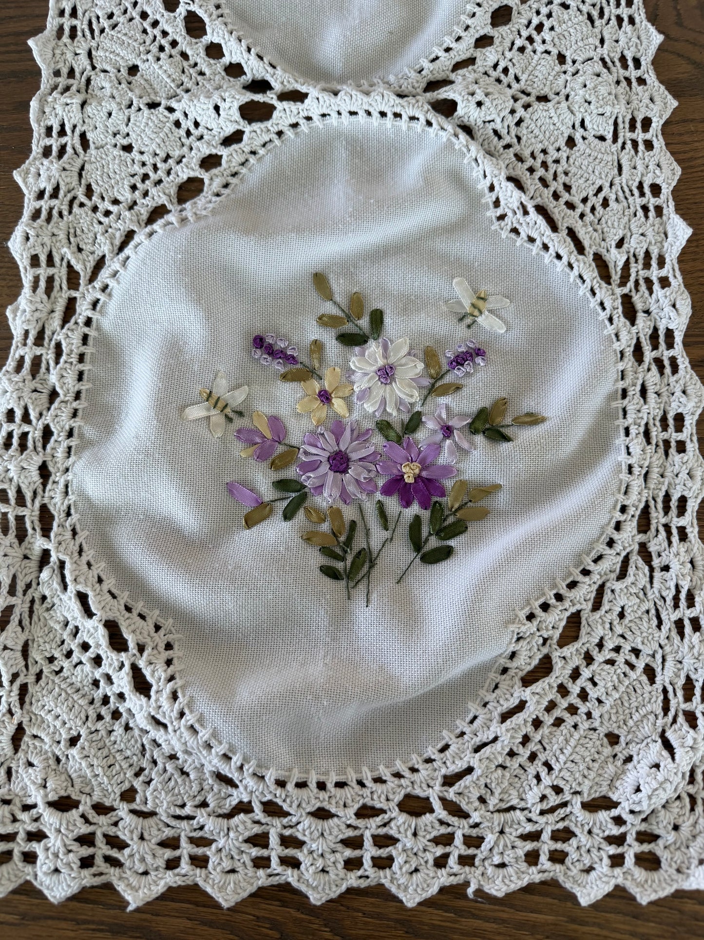 Handmade white cotton crochet lace table runner with purple floral ribbon embroidery