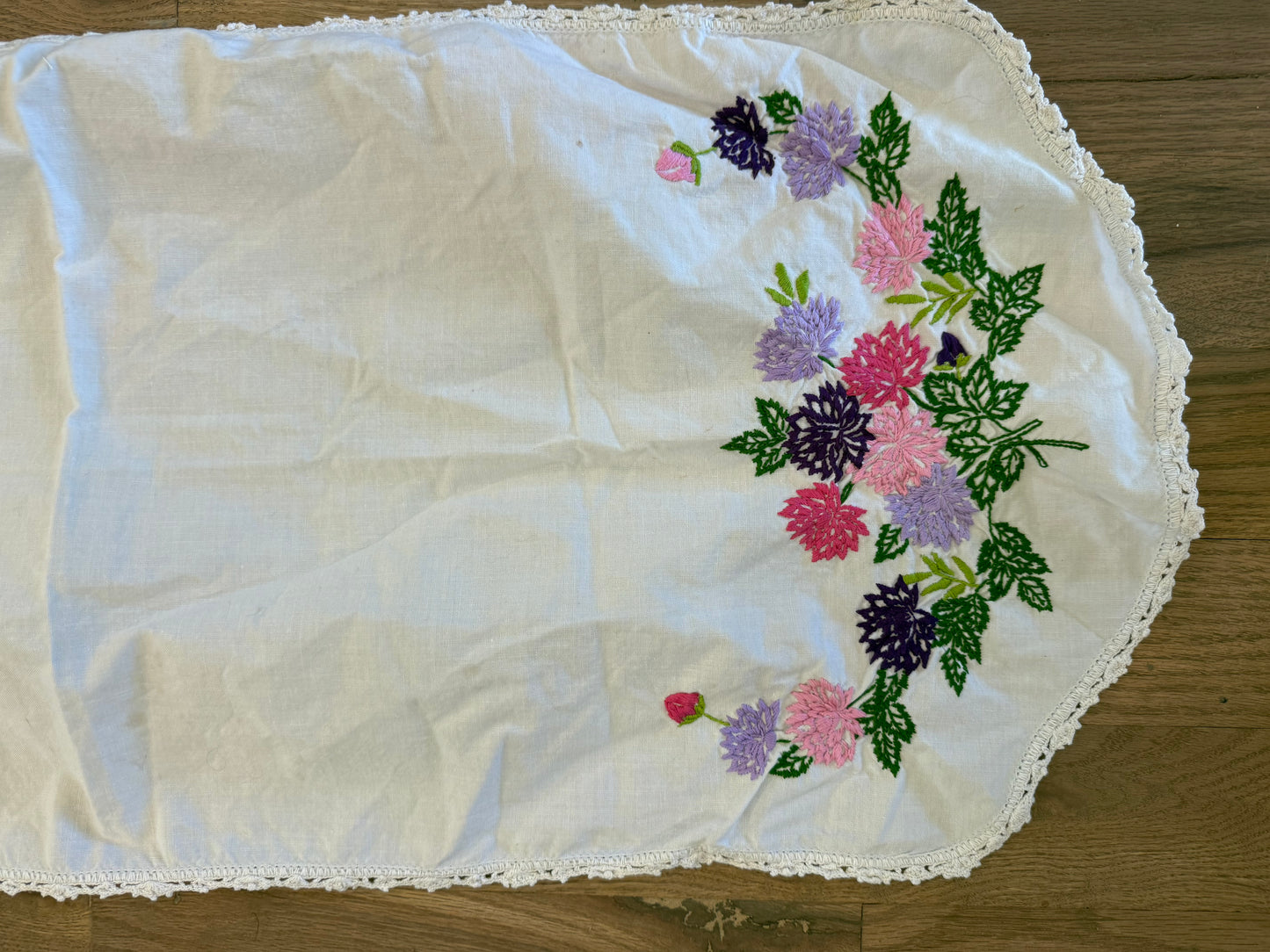 Purple and pink embroidered table runner