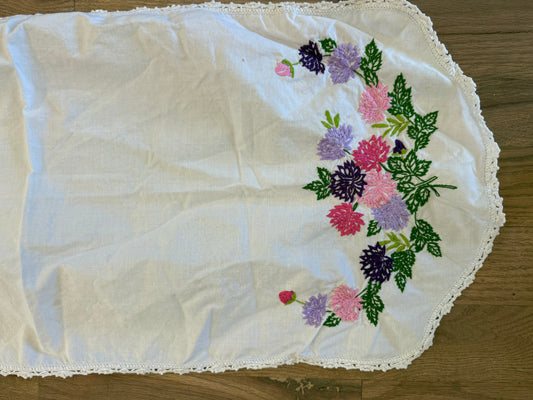 Purple and pink embroidered table runner