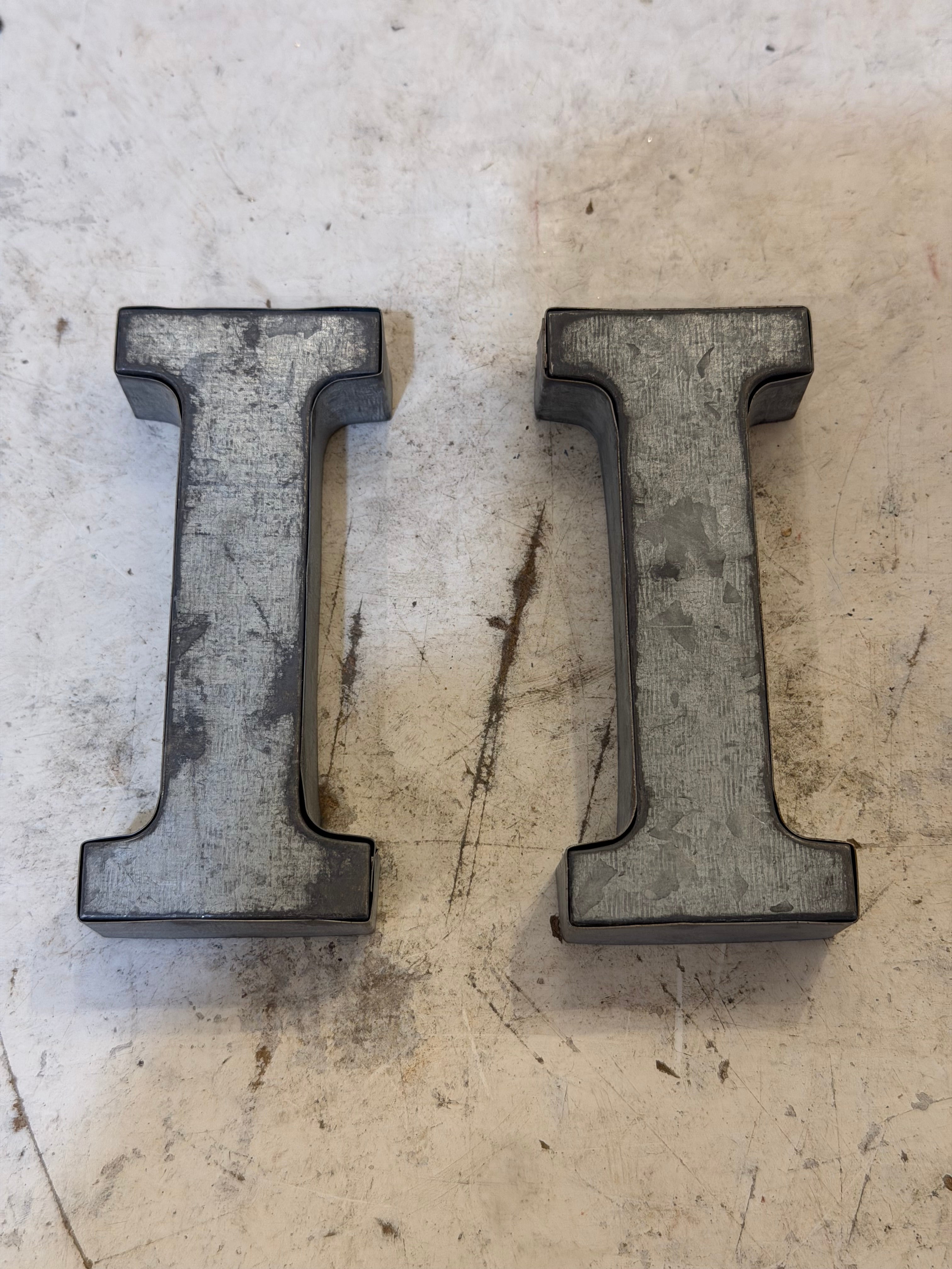 Rustic galvanized, tin letters sold individually Rusted galvanized, tin letters sold individually 3-3/4” - hanging hardware on back