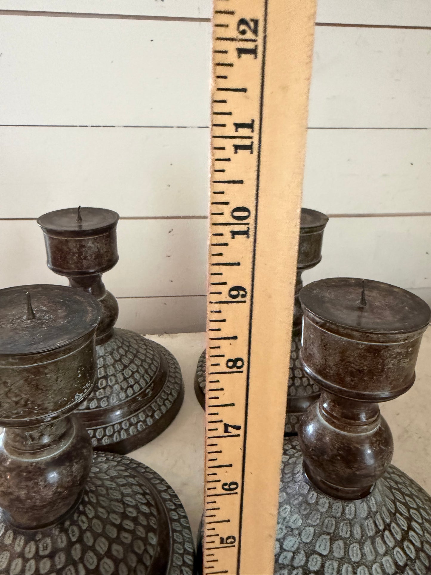 Bronze toned pillar candlestick sold individually