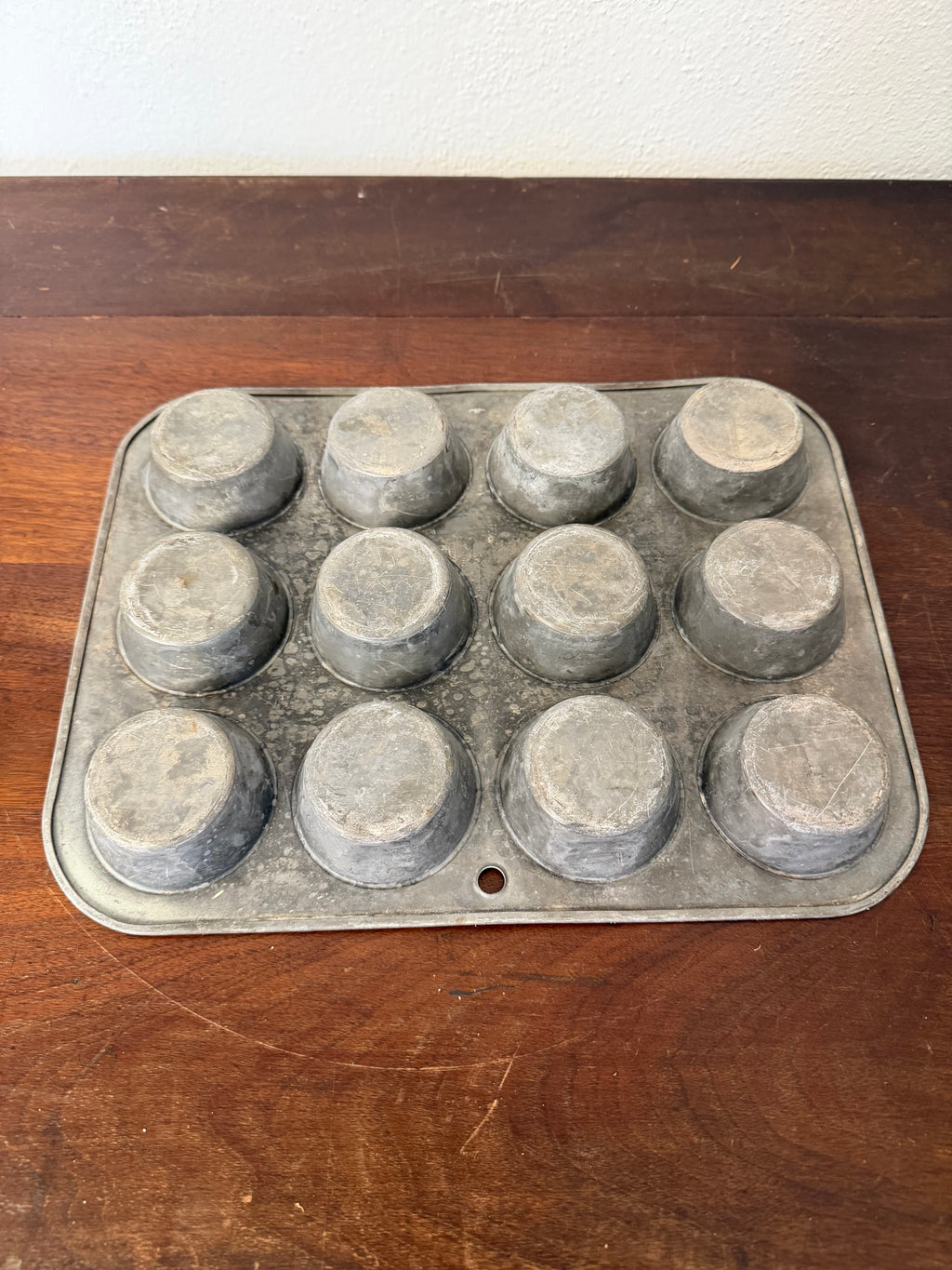 Vintage green enamel muffin tin