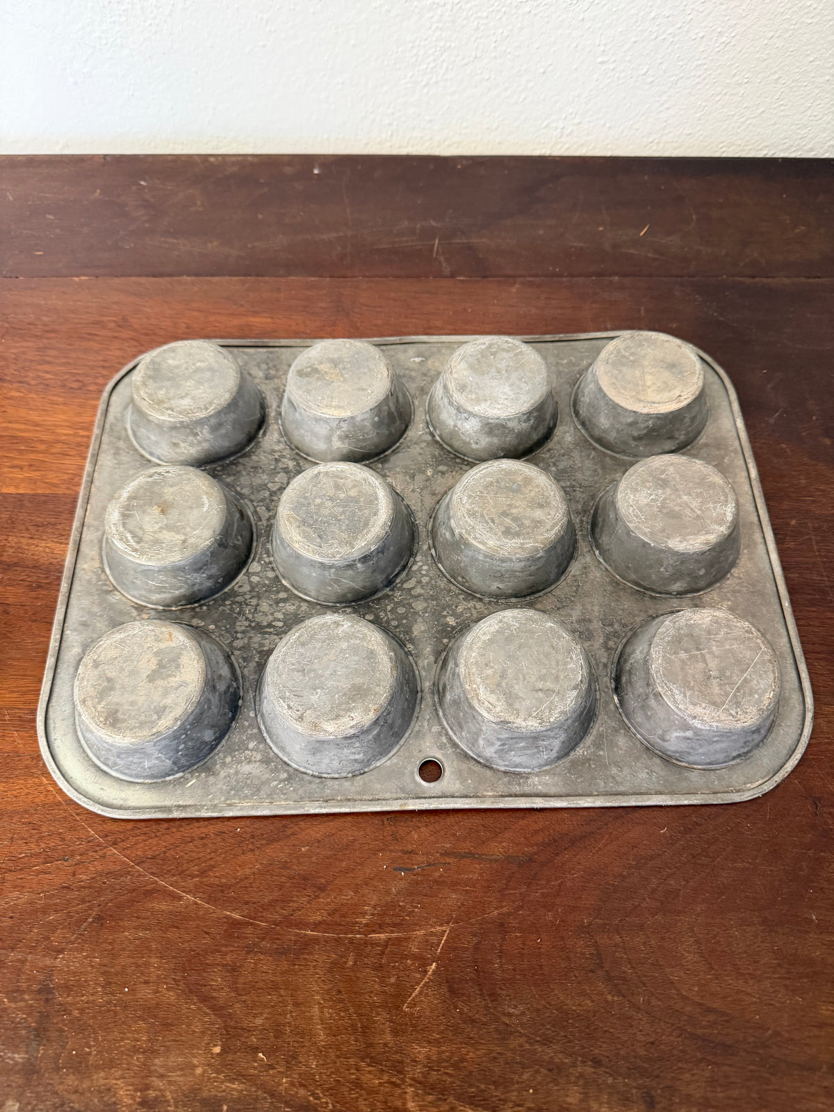 Vintage green enamel muffin tin