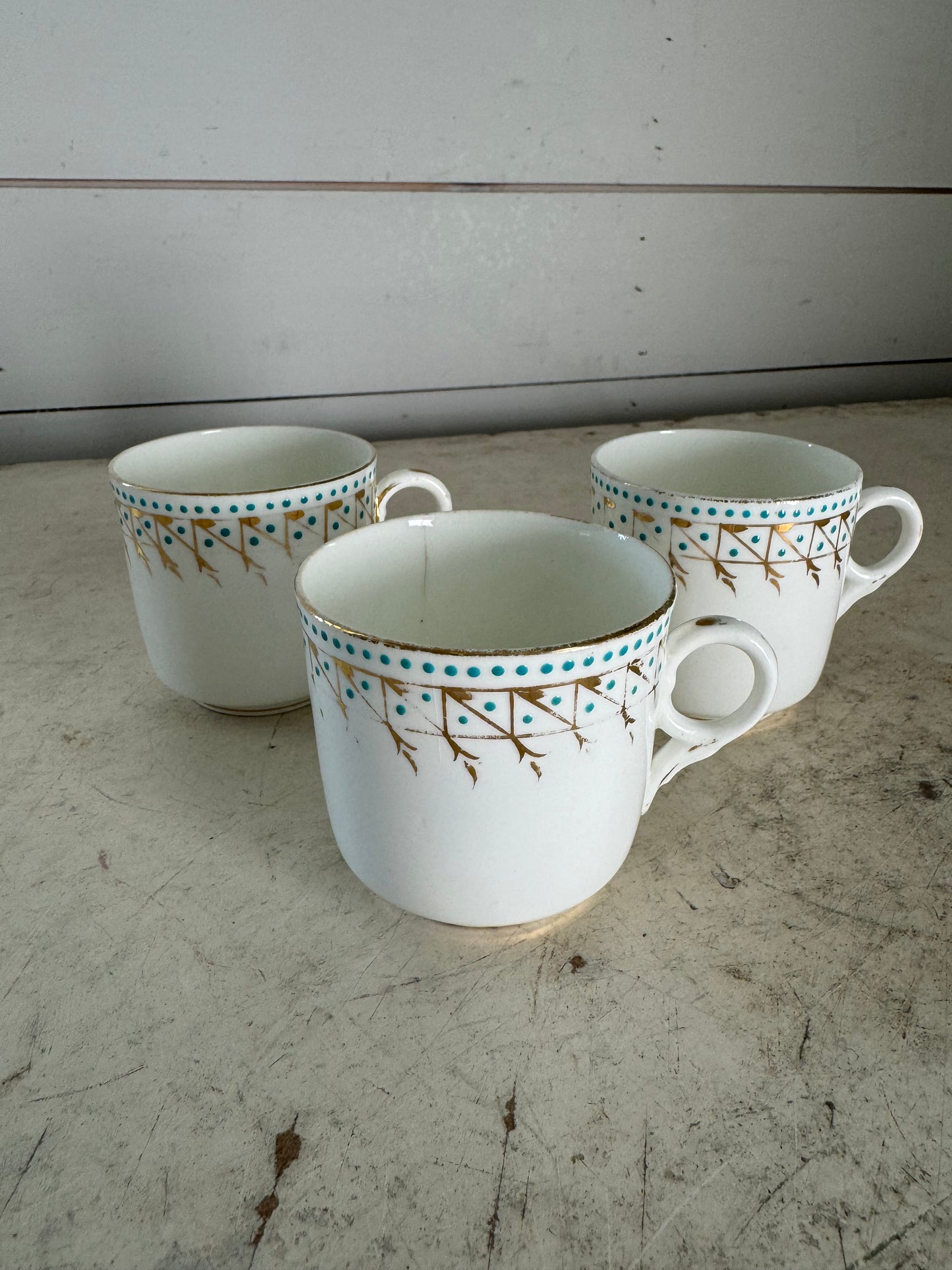 Vintage gold turquoise tea cups sold individually, has cracks and imperfections as shown