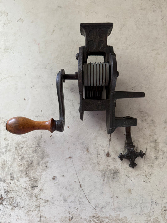 Antique Ornately detailed cast Iron bean cutter