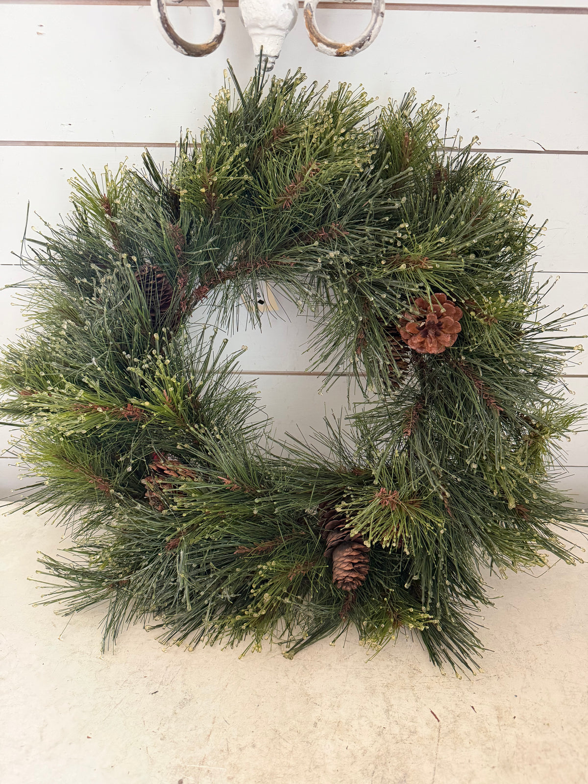 Christmas wreath with pinecones